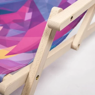 Lounger with armrest
