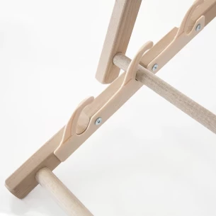 Lounger with armrest